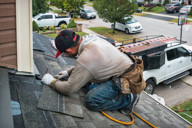 Professional Roofing technician working in East Syracuse, NY